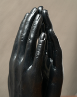 PORTA LIBROS MANOS NEGRAS