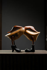 ESCULTURA PATOS ABRAZADOS